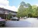 Apartment building with a parking lot view at 7 Shepherd Ln # Bldg D, Chapel Hill, NC 27514