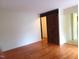 Spacious living room featuring hardwood floors and a barn door at 7 Shepherd Ln # Bldg D, Chapel Hill, NC 27514