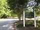 Entrance to Shepherd Lane, a welcoming condominium community, featuring lush greenery and peaceful surroundings at 7 Shepherd Ln # Bldg D, Chapel Hill, NC 27514