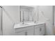 Modern bathroom with double sink vanity, quartz countertop, and large mirror at 7370 Michelle Rd, Rocky Mount, NC 27803