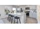 Modern kitchen with a granite countertop island and stainless steel appliances at 7384 Michelle Rd, Rocky Mount, NC 27803