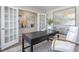 Well-appointed home office with French doors, stylish desk, and comfortable seating at 7384 Michelle Rd, Rocky Mount, NC 27803
