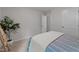 Bright bedroom with a calming color scheme and a lush green potted plant at 7400 Michelle Rd, Rocky Mount, NC 27803