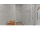 Spacious walk-in closet with multiple shelves and woven storage basket at 7400 Michelle Rd, Rocky Mount, NC 27803