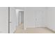 Bright bedroom features neutral walls and carpeting, offering a serene and inviting atmosphere at 7416 Michelle Rd, Rocky Mount, NC 27803
