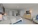 Relaxing bedroom featuring a comfortable bed, soothing colors, and natural light from two windows at 7434 Michelle Rd, Rocky Mount, NC 27803