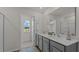 Bright bathroom features a double vanity, ample counter space, and modern fixtures at 7475 Michelle Rd, Rocky Mount, NC 27803