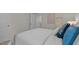 Comfortable bedroom featuring a plush bed with stylish pillows and natural light at 7475 Michelle Rd, Rocky Mount, NC 27803