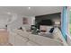 Inviting living room featuring a modern sofa, dark accent wall, and stylish decor at 7475 Michelle Rd, Rocky Mount, NC 27803
