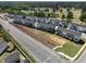 New construction community with street view, showing modern home designs at 751 Parc Townes Dr # 32, Wendell, NC 27591