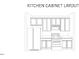 Kitchen layout featuring cabinets, countertops, and appliance placements for a functional and stylish design at 751 Parc Townes Dr # 32, Wendell, NC 27591