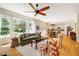 Open concept living area boasts hardwood floors, neutral paint, and seamlessly connects to the kitchen and dining area at 815 Solitude Pt, Chapel Hill, NC 27516