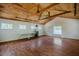 Spacious room with wood flooring, vaulted wood ceiling, and bright natural light at 815 Solitude Pt, Chapel Hill, NC 27516