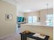 Loft area featuring carpet, a console table, a pendant light, and natural light at 815 Solitude Pt, Chapel Hill, NC 27516