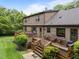 Large wooden deck with outdoor seating, perfect for entertaining and relaxation at 8509 Oneal Rd, Raleigh, NC 27613