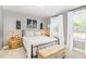 Serene bedroom showcasing neutral tones, natural light, and tasteful decor at 8615 Kenridge Ln, Fuquay Varina, NC 27526