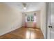 Cozy bedroom with hardwood floors and a ceiling fan at 1000 Winona Rd, Raleigh, NC 27609