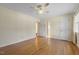 Inviting bedroom featuring hardwood floors and ensuite access at 1000 Winona Rd, Raleigh, NC 27609