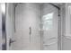 Modern tiled shower with a glass door and sleek fixtures at 1000 Winona Rd, Raleigh, NC 27609