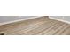 Close-up of durable, light-colored, wide-planked wood-look flooring at 1003 Wicksteed Ct, Apex, NC 27502