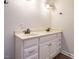 Double vanity bathroom with white cabinets, framed mirrors, and dark bronze hardware at 101 Temple Gate Dr, Cary, NC 27518