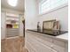 A closet featuring a built-in shelving unit and drawers with a dark countertop at 101 Temple Gate Dr, Cary, NC 27518