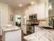 Well-appointed kitchen featuring granite countertops, stainless appliances, and modern fixtures at 101 Temple Gate Dr, Cary, NC 27518