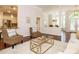 Open living space with cozy seating, open kitchen access, and stylish decor at 101 Temple Gate Dr, Cary, NC 27518