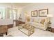 Comfortable living room with stylish decor and views of the front entrance and adjoining rooms at 101 Temple Gate Dr, Cary, NC 27518