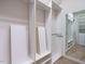 Walk-in closet with custom shelving and hanging rods at 101 Temple Gate Dr, Cary, NC 27518