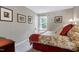 Cozy bedroom featuring soft lighting, warm colors, and comfortable furnishings at 103 Uxbridge Ct, Cary, NC 27513