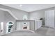 Open landing offers an airy feel with views from its many windows at 103 Uxbridge Ct, Cary, NC 27513