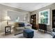 Bright and airy living room with modern furnishings and natural light at 103 Uxbridge Ct, Cary, NC 27513