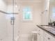 This bathroom features a glass shower with white subway tiles, and decorative tile accent at 104 Deer Park Ln, Cary, NC 27518