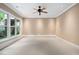 A bonus room with large windows and natural light at 10405 Veasey Mill Rd, Raleigh, NC 27615