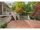 Multi-level outdoor deck, great for entertaining, and overlooking a lush wooded area at 10405 Veasey Mill Rd, Raleigh, NC 27615