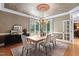 Formal dining room features elegant chandelier, buffet and ample natural light at 10405 Veasey Mill Rd, Raleigh, NC 27615