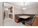 Cozy breakfast nook with booth seating and a view into the kitchenette at 10405 Veasey Mill Rd, Raleigh, NC 27615