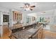 Open concept kitchen features large island with granite countertop and stainless steel sink at 10405 Veasey Mill Rd, Raleigh, NC 27615