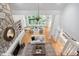 Spacious living room with high ceilings, fireplace, and expansive windows offering natural light at 10405 Veasey Mill Rd, Raleigh, NC 27615