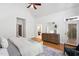 Bright main bedroom featuring wood floors and ample natural light from the outdoor access at 10405 Veasey Mill Rd, Raleigh, NC 27615