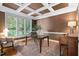 Inviting office with a coffered ceiling, large window, hardwood floors, and natural light at 10405 Veasey Mill Rd, Raleigh, NC 27615
