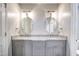 Elegant bathroom with double sink vanity, granite countertops, and updated fixtures at 10816 Bent Branch Dr, Raleigh, NC 27603