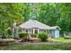 This charming home features a spacious backyard, a lovely deck, and tasteful landscaping at 10816 Bent Branch Dr, Raleigh, NC 27603