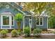 Charming home exterior with attractive landscaping, a welcoming entrance, and lots of curb appeal at 10816 Bent Branch Dr, Raleigh, NC 27603