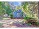 Charming home with mature landscaping and an outbuilding at 10816 Bent Branch Dr, Raleigh, NC 27603