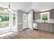 Well-lit kitchen area with backyard views, featuring modern appliances and stylish cabinetry at 10816 Bent Branch Dr, Raleigh, NC 27603