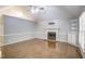 Bright living room with hardwood floors, fireplace, and a built-in cabinet at 10816 Bent Branch Dr, Raleigh, NC 27603