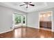 Large main bedroom with hardwood floors, bay window and en-suite bathroom with granite counters at 10816 Bent Branch Dr, Raleigh, NC 27603