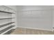 Walk-in closet featuring shelving and railing for optimal organization at 1156 Craigmeade Dr, Morrisville, NC 27560
